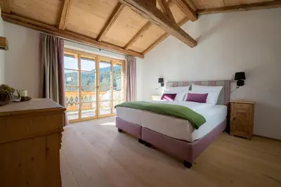 Ein Bett oder Betten in einem Zimmer der Unterkunft Ferienwohnungen Fendl
