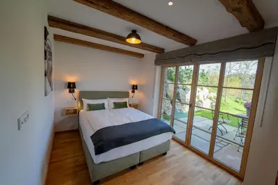 Ein Bett oder Betten in einem Zimmer der Unterkunft Ferienwohnungen Fendl
