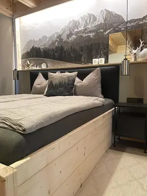 Ein Bett oder Betten in einem Zimmer der Unterkunft Ferienwohnung Dahoam