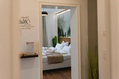 Ein Bett oder Betten in einem Zimmer der Unterkunft YAYstay - 