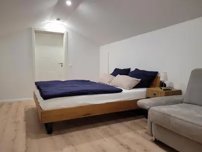 Ein Bett oder Betten in einem Zimmer der Unterkunft Beim Mooswiesler Dahoam
