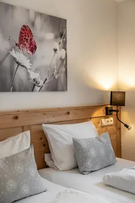 Ein Bett oder Betten in einem Zimmer der Unterkunft Mountain Lodge