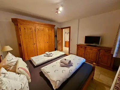 Ein Bett oder Betten in einem Zimmer der Unterkunft Ferienwohnung Soiernseelig