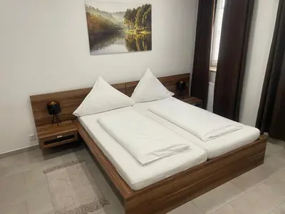Ein Bett oder Betten in einem Zimmer der Unterkunft private parking,old town,52m2,terrace,no stairs, newly renovated,