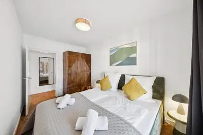 Ein Bett oder Betten in einem Zimmer der Unterkunft Casa Tantris - in Gmund am Tegernsee