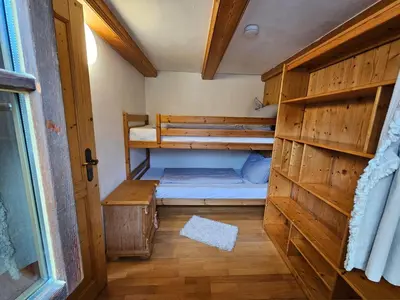 Ein Bett oder Betten in einem Zimmer der Unterkunft Gästehaus zum Giggerer