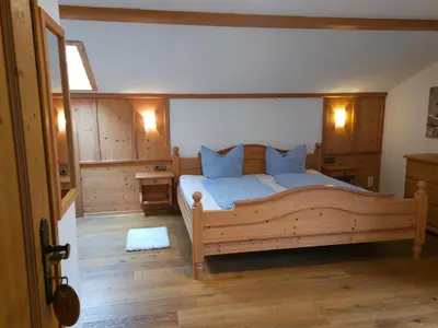 Ein Bett oder Betten in einem Zimmer der Unterkunft Gästehaus zum Giggerer