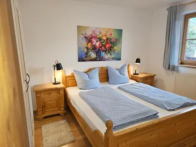 Ein Bett oder Betten in einem Zimmer der Unterkunft Gästehaus zum Giggerer