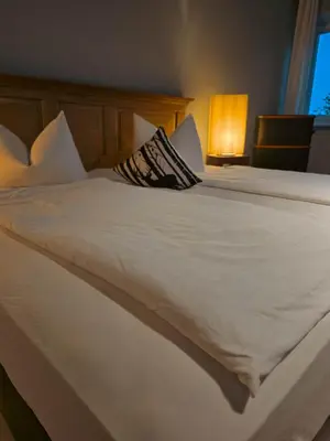 Ein Bett oder Betten in einem Zimmer der Unterkunft Gasthof Staudham