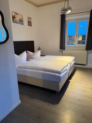 Ein Bett oder Betten in einem Zimmer der Unterkunft Gasthof Staudham