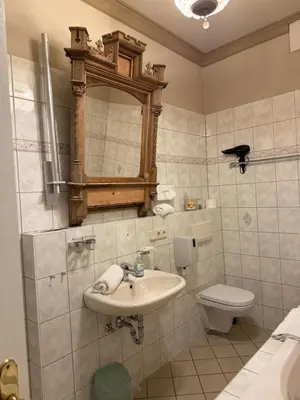 Ein Badezimmer in der Unterkunft Gasthof Staudham