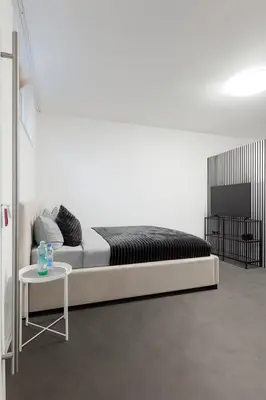 Ein Bett oder Betten in einem Zimmer der Unterkunft Airport Apartment 64 in Freising