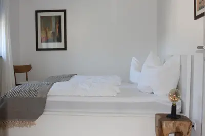 Ein Bett oder Betten in einem Zimmer der Unterkunft Ferienwohnung Ferdinand
