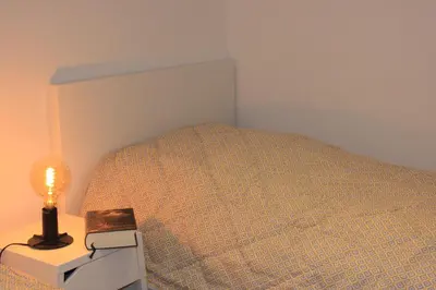 Ein Bett oder Betten in einem Zimmer der Unterkunft Ferienwohnung Ferdinand