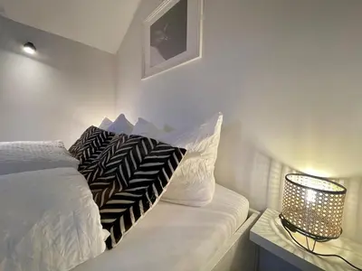 Ein Bett oder Betten in einem Zimmer der Unterkunft Ferienwohnung Mangfall - Berge, Natur und Ruhe