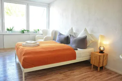 Ein Bett oder Betten in einem Zimmer der Unterkunft Apartment mitten in Rosenheim