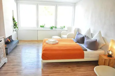 Ein Bett oder Betten in einem Zimmer der Unterkunft Apartment mitten in Rosenheim