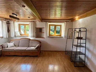 Ein Sitzbereich in der Unterkunft Ferienwohnung Beim Straßer