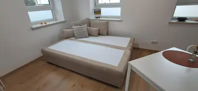 Ein Bett oder Betten in einem Zimmer der Unterkunft kreuzwirt bayern