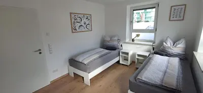 Ein Bett oder Betten in einem Zimmer der Unterkunft kreuzwirt bayern