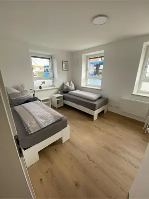 Ein Bett oder Betten in einem Zimmer der Unterkunft kreuzwirt bayern