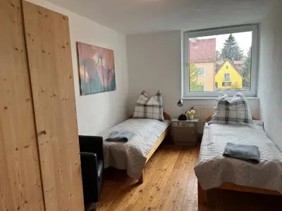 Ein Bett oder Betten in einem Zimmer der Unterkunft Ferienwohnung in Landsberg am Lech