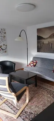 Ein Sitzbereich in der Unterkunft Ferienwohnung in Landsberg am Lech