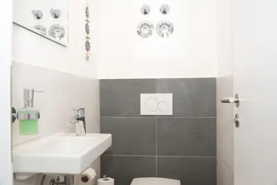 Ein Badezimmer in der Unterkunft Ferienwohnung Alpenzeit Unterwössen im Chiemgau