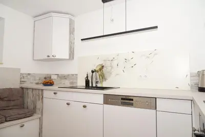 Küche/Küchenzeile in der Unterkunft Ferienwohnung Alpenzeit Unterwössen im Chiemgau