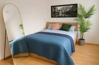 Ein Bett oder Betten in einem Zimmer der Unterkunft Quiet & Modern Studio near Tram & River Lech