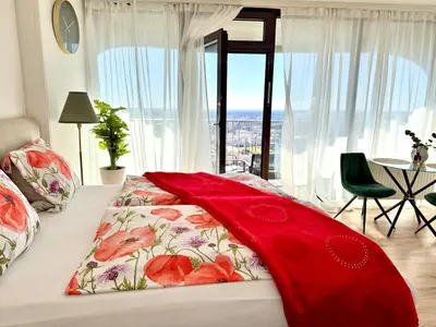 Ein Bett oder Betten in einem Zimmer der Unterkunft Charmantes Appartement im 25 OG mit Aussicht und 60 Zoll TV