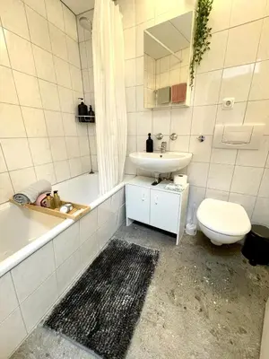 Ein Badezimmer in der Unterkunft Charmantes Appartement im 25 OG mit Aussicht und 60 Zoll TV