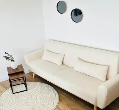Ein Sitzbereich in der Unterkunft Charmantes Appartement im 25 OG mit Aussicht und 60 Zoll TV