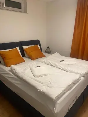 Ein Bett oder Betten in einem Zimmer der Unterkunft HDM Apart Munich