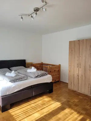 Ein Bett oder Betten in einem Zimmer der Unterkunft Ferienwohnung Harpfing