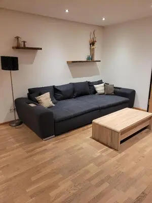 Ein Sitzbereich in der Unterkunft Ferienwohnung Harpfing