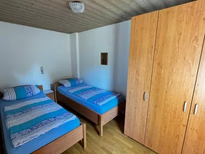 Ein Bett oder Betten in einem Zimmer der Unterkunft Ferienwohnungen Gmeiner
