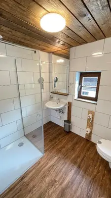 Ein Badezimmer in der Unterkunft RamsAu-das Gasthaus