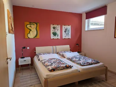 Ein Bett oder Betten in einem Zimmer der Unterkunft Ferienwohnung Am Schlössle