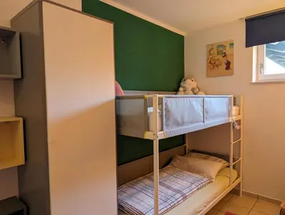 Ein Bett oder Betten in einem Zimmer der Unterkunft Ferienwohnung Am Schlössle