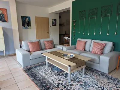 Ein Sitzbereich in der Unterkunft Ferienwohnung Am Schlössle