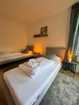 Ein Bett oder Betten in einem Zimmer der Unterkunft Bavaria Home Apartments Geisenfeld