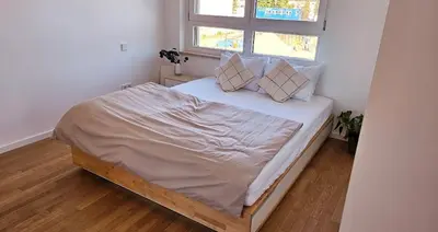 Ein Bett oder Betten in einem Zimmer der Unterkunft Luxurious 2 Room Apartment