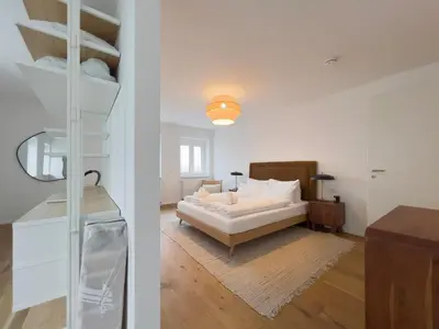 Ein Bett oder Betten in einem Zimmer der Unterkunft Exklusives City-Apartment Augsburg I Stilvoll & modern