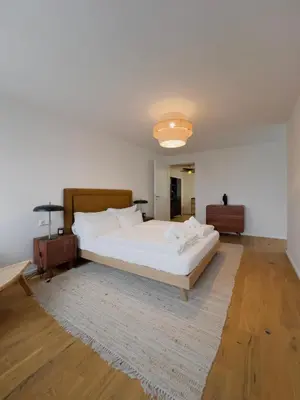 Ein Bett oder Betten in einem Zimmer der Unterkunft Exklusives City-Apartment Augsburg I Stilvoll & modern