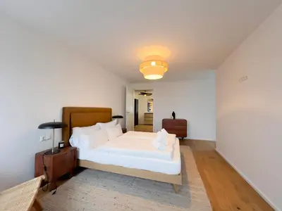 Ein Bett oder Betten in einem Zimmer der Unterkunft Exklusives City-Apartment Augsburg I Stilvoll & modern