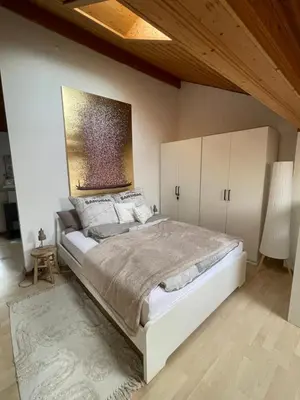 Ein Bett oder Betten in einem Zimmer der Unterkunft Architect-Apartments Atelier 42qm, Küche und Bad