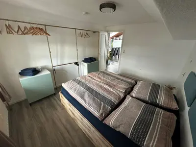 Ein Bett oder Betten in einem Zimmer der Unterkunft Heimat Apartment