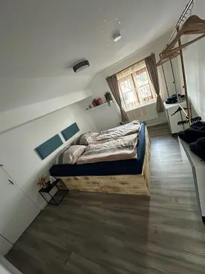 Ein Bett oder Betten in einem Zimmer der Unterkunft Heimat Apartment