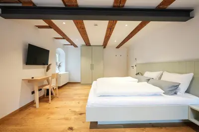 Ein Bett oder Betten in einem Zimmer der Unterkunft Gasthof am Schloss